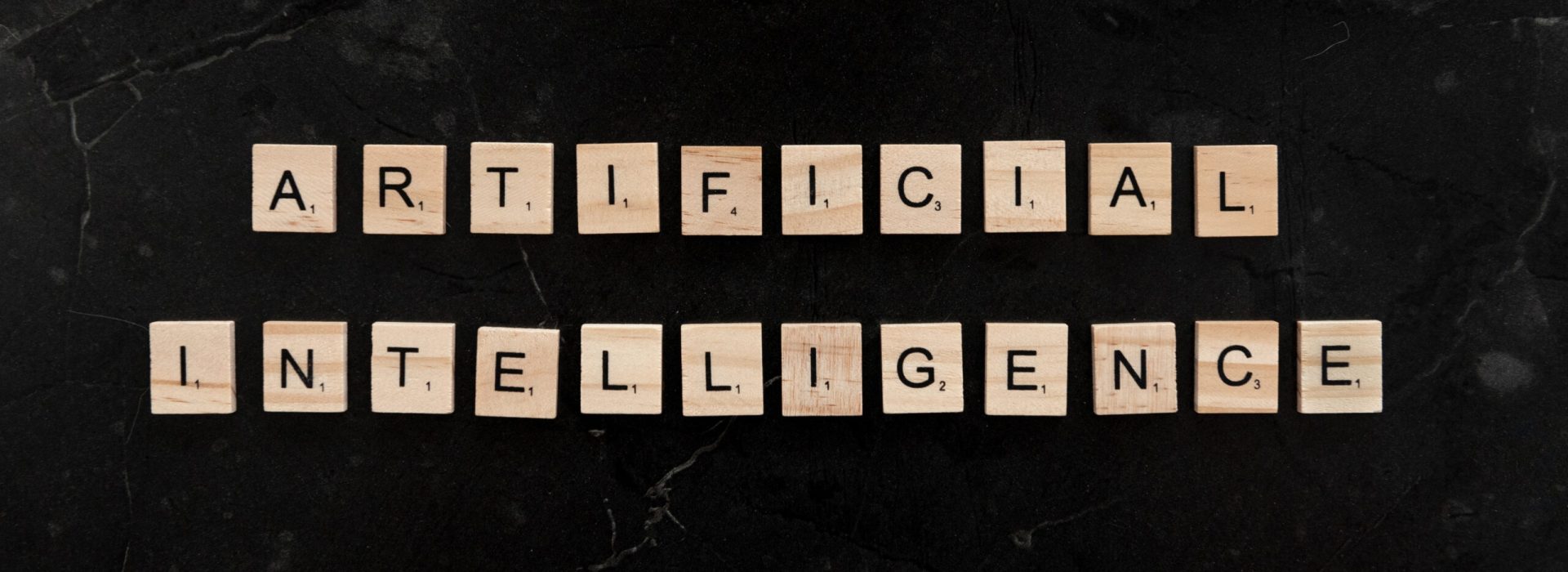 wooden-tiles-spelling-artificial-intelligence-on-2023-04-11-00-22-19-utc (1)